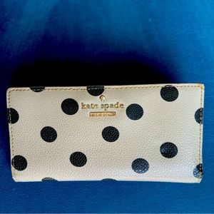 Kate Spade Beige/Gray with black polka dots.